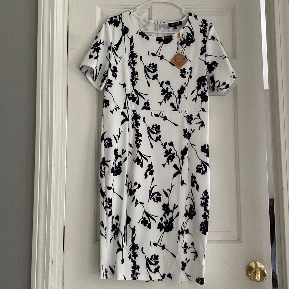 Light airy white dress with black floral design